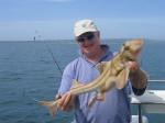 Pat Ellaby with a 9lb Port Phillip Shark caught in Australia.